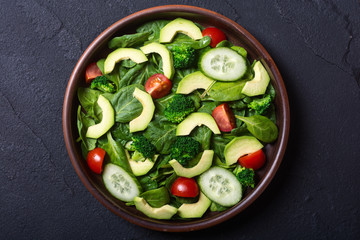 Wall Mural - Avocado salad with tomatoes