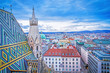 Lovely view from above of Vienna - the capital of Austria, European country. Iconic landmark and extremely popular European travel destination. View over roofs on classic architecture, day scenery.