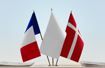 Flags of France and Denmark with a white flag in the middle