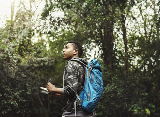 Wall Mural - Biologist in a forest exploring