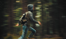 Man Running In The Forest