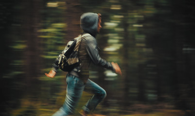 man running in the forest