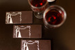 © Yana - Three chocolate bars with the image of the bride and groom. Chocolate candy, tiles.