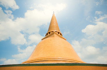 Top pagoda in Bowonniwet Vihara temple on blue sky, Thailand