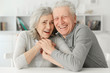 © aletia2011 - senior couple laughing  at home