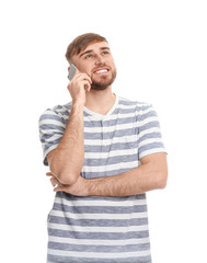 Sticker - Young man talking on mobile phone against white background