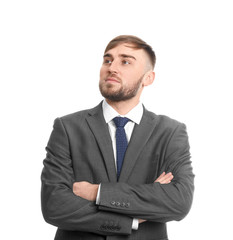 Sticker - Young thoughtful businessman in suit on white background