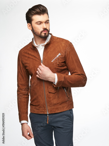 Fashion Portrait Of Handsome Male Model With Dark Hair Beard And