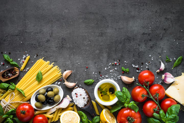 Poster - Italian Food background on black stone table. Top view.