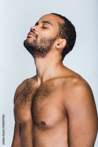 Concentration And Patience Portrait Of Handsome Shirtless Young