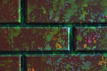  Mixed media artwork, abstract colorful artistic painted layer in brown, green color palette on grunge brick wall texture photography background