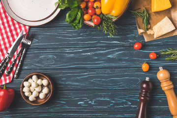 top view of vegetables on wooden table in kitchen