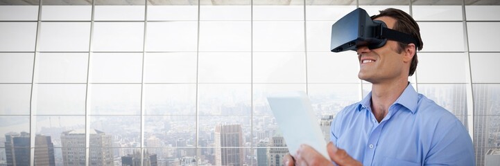 Poster - Composite image of close up of businessman with tablet using vr
