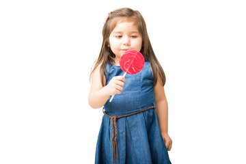 Poster - Little girl ready to lick round lollipop