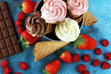 Wall Mural - Vanilla frozen yogurt or soft ice cream in waffle cone.