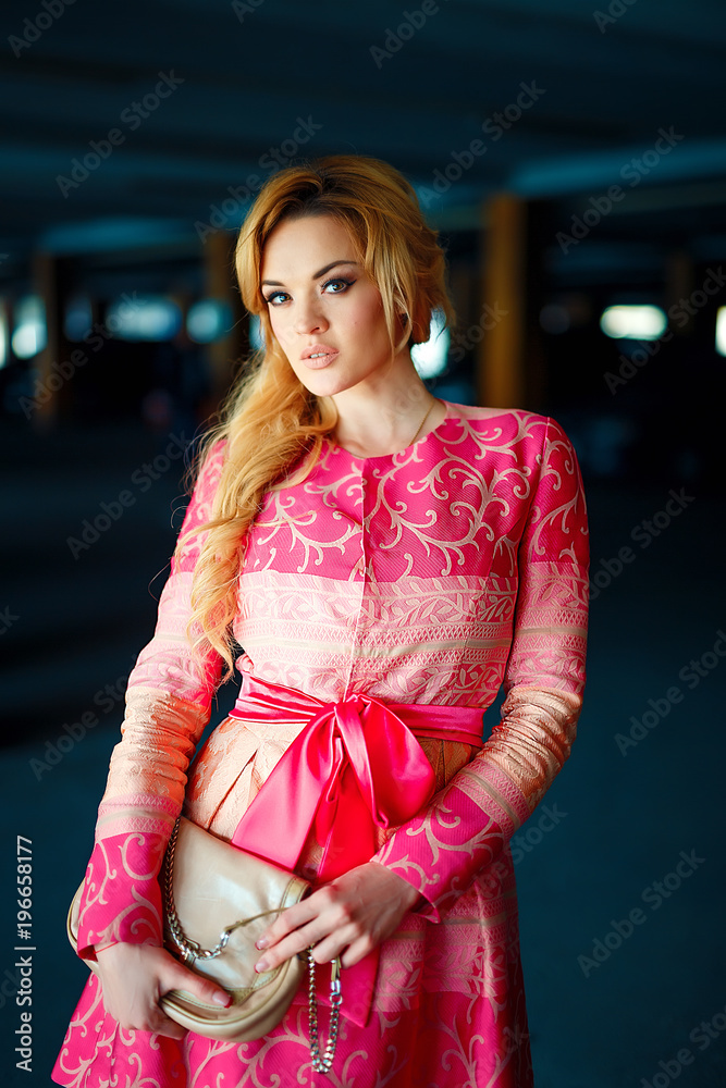 fashion photo of beautiful young girl with blond hair wearing luxurious ...