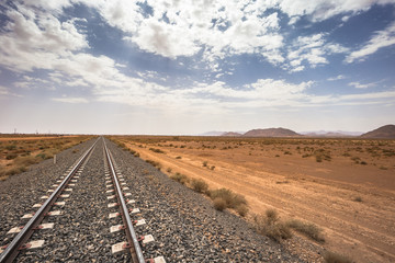 Wall Mural - Algeria - June 07, 2017: Railway tracks on the countryside of Algeria