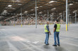 © Jetta Productions/Stocksy - Warehouse workers in storage facilty