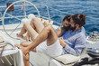 © Lumina/Stocksy - Young couple enjoying sail boat
