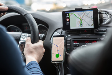 Driver in the car controls the navigator