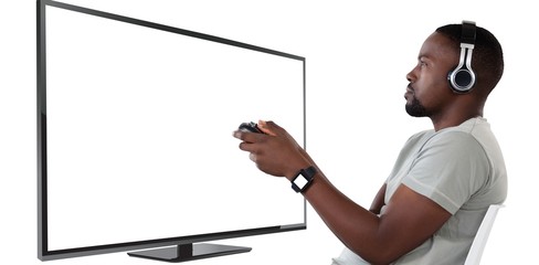 Poster - Composite image of man playing video game against white
