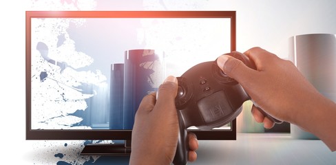 Poster - Composite image of hand of man playing video game against white