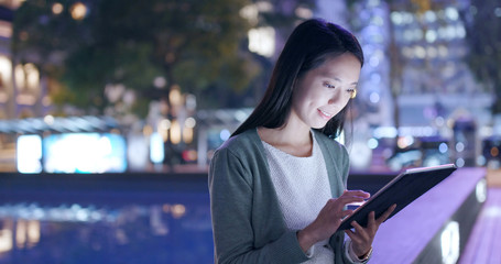 Wall Mural - Woman use of tablet computer