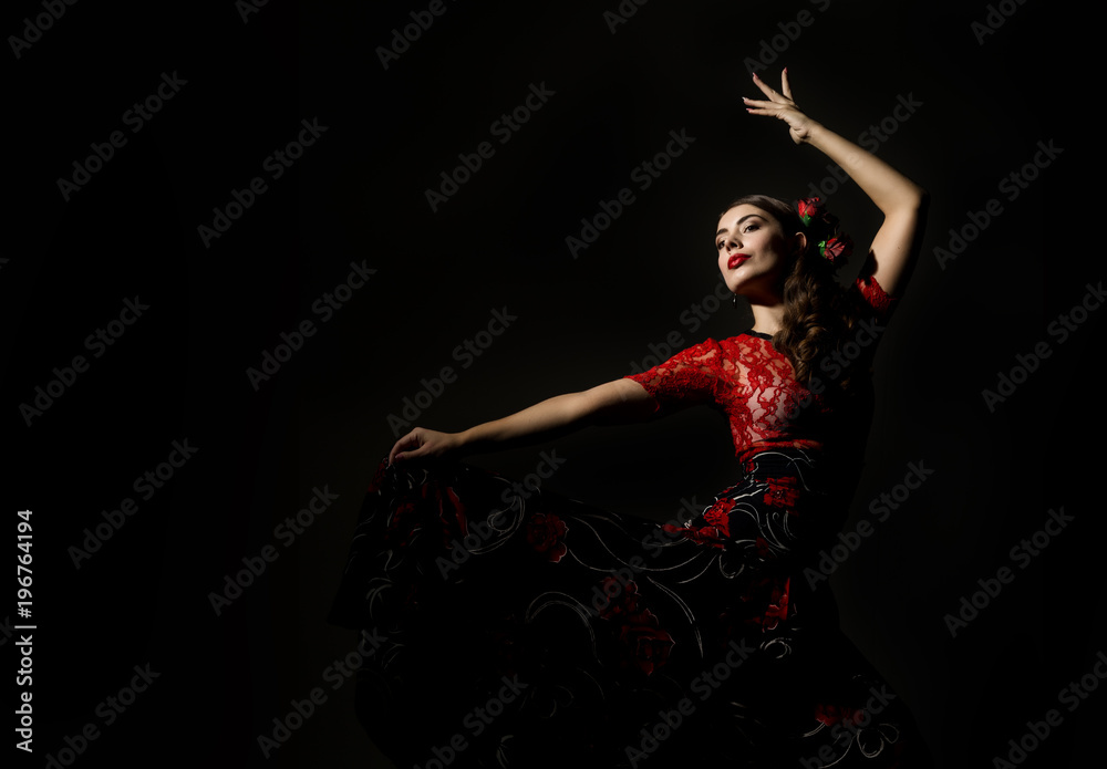 flamenco dancer on a dark background. free space for your text - obrazy, fototapety, plakaty 