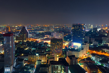 Cityscape at sunset sky by long shutter speed in Bangkok City of Thailand.