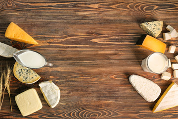 Wall Mural - Fresh dairy products on wooden background