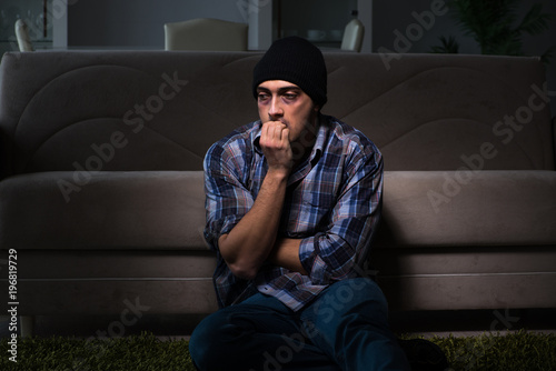 Cuadros en Lienzo Young man in agony having problems with narcotics