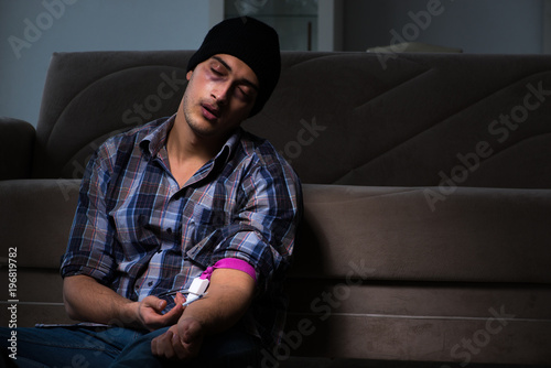 Fotografía Young man in agony having problems with narcotics
