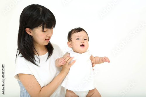若いお母さんと遊ぶ笑顔の女の子の赤ちゃん Stock Photo Adobe Stock 若いお母さんと遊ぶ笑顔の女の子の赤ちゃん Stock Photo Adobe Stock