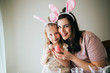 © MeganBetteridge - Mother and Daughter Painting Easter Eggs together