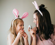 © MeganBetteridge - Mother and Daughter Painting Easter Eggs together
