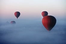 Red Balls In The Morning In The Fog Above Bagan. Bagan  Is An Ancient City Located In The Mandalay Region Of Myanmar