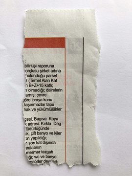 serbest yırtılmış gazete küpürü