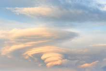 Landscape With Lenticular Clouds At Sunset  Blue Sky