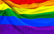Rainbow gay pride flag, three dimensional render, satin texture