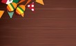 Mexican holiday background. Mexican flag, maracas on brown wooden background. Top view. Vector illustration