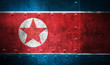 north korea flag on grunge wall