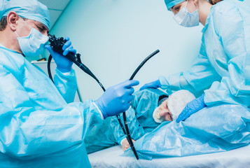 Wall Mural - Endoscopy at the hospital. Doctor holding endoscope before gastroscopy