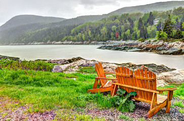 Wall Mural - Port-au-Persil beach in Quebec, Canada Charlevoix region during stormy rainy day with Saint Lawrence river landscape