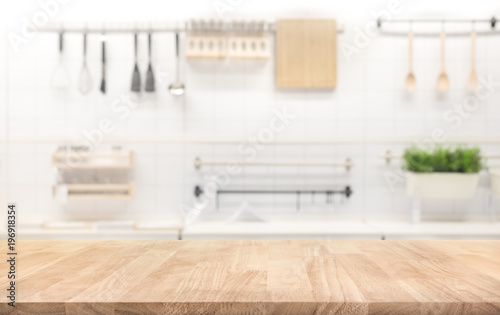 Fotomural Wood table top on blur kitchen room background