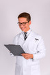 © Bitmap - Male Doctor standing with folder, on white background