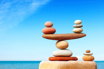 Wall Mural - Concept of harmony and balance. Balance stones against the sea.