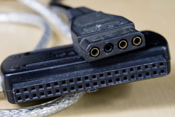 IDE and USB socket on a wooden workshop table. Computer connectors used in electronics.