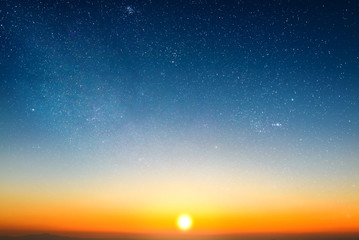 sunrise in morning sky with star and milky way background
