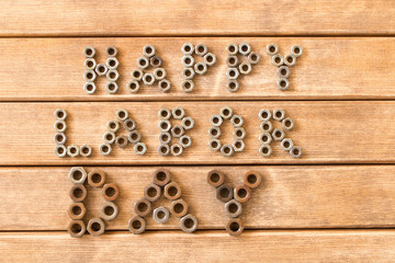 Wall Mural - Labor day.  Different tools on a wooden table