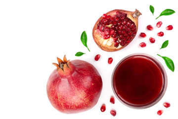 pomegranate juice with fresh pomegranate fruits isolated on white background with copy space for your text. Top view